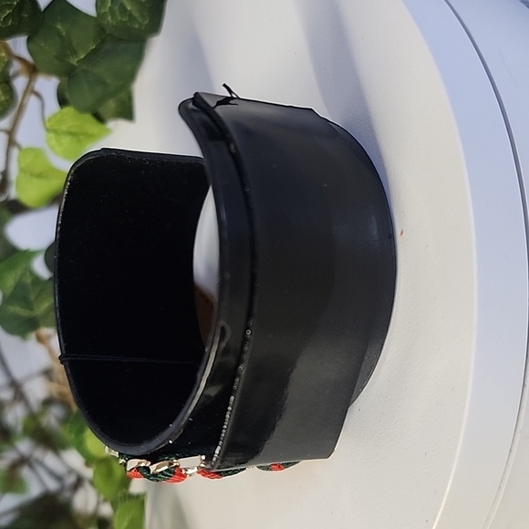 Black Open Cuff Bracelet with Gold Bee Emblem - Picture 3 of 9